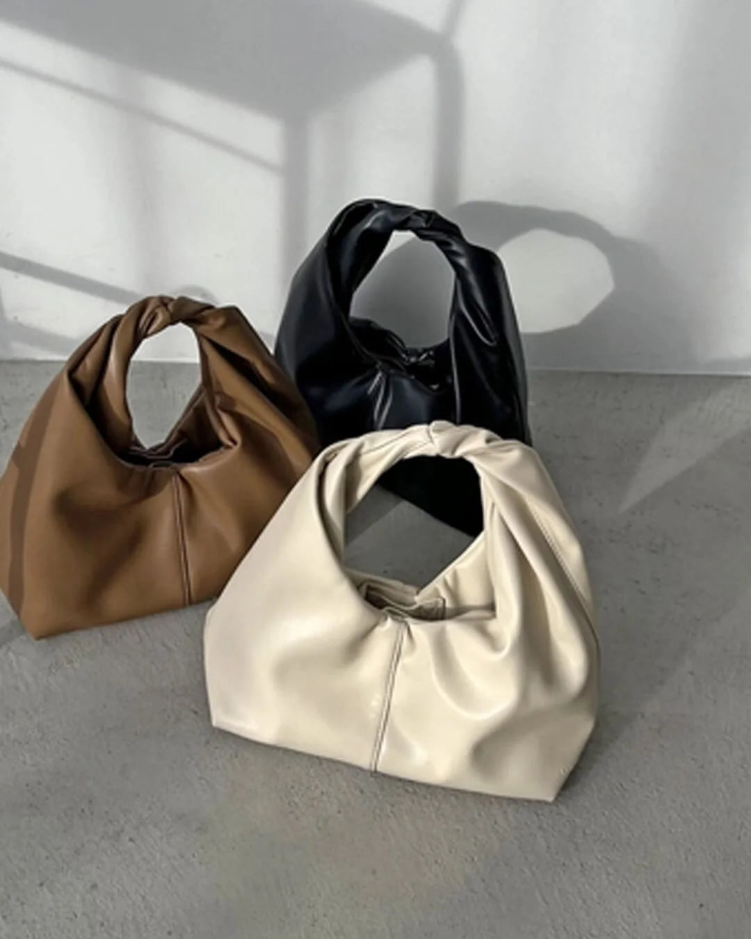 Gelyn Clutch Leather Bag